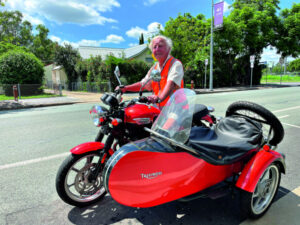 Day tripping into Rosewood on his favourite motorcycle