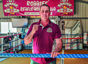 Boxing coach gives kids new skills
