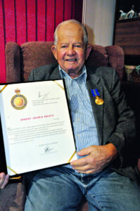 Marburg resident presented at Government House