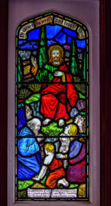 OUR HISTORY – Love and devotion inscribed on a church window