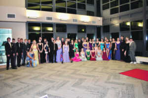 Elegant, suited and booted, Rosewood high students go out in style